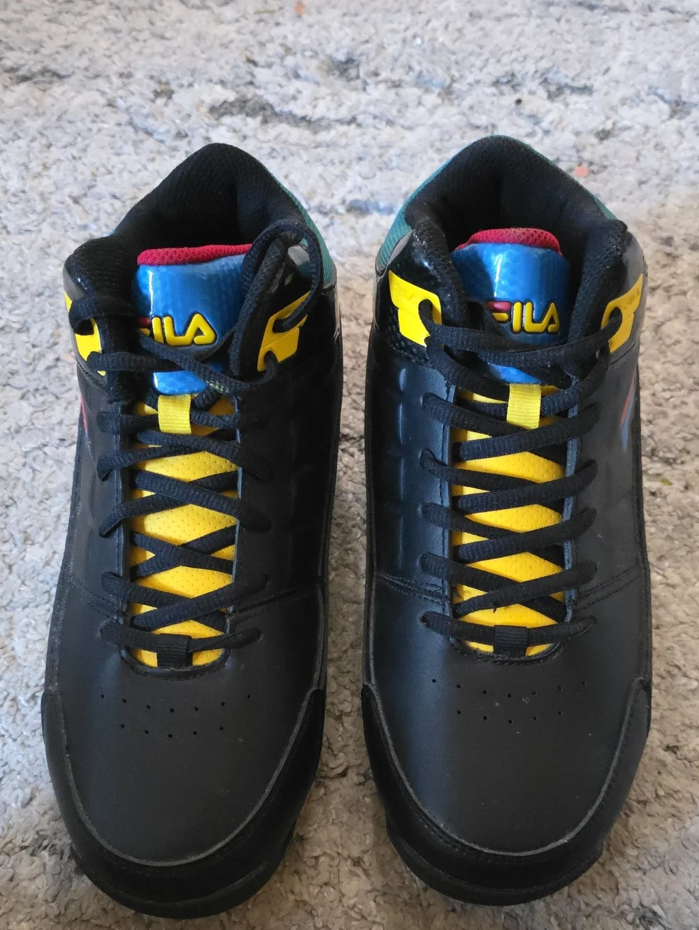 FILA Black High-Top Sneakers with Yellow and Blue Accents